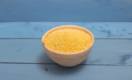 millet groats diet supplements on the blue board