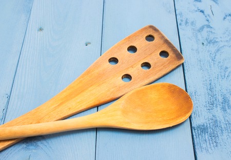 kitchen tools on a blue board closeupの写真素材