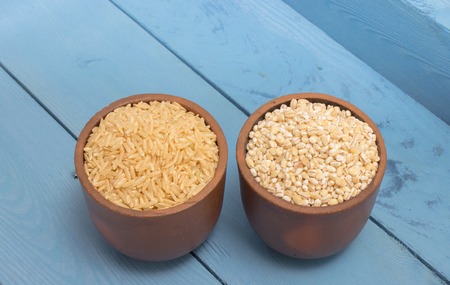 buckwheat groats and rice diet supplements on the blue board