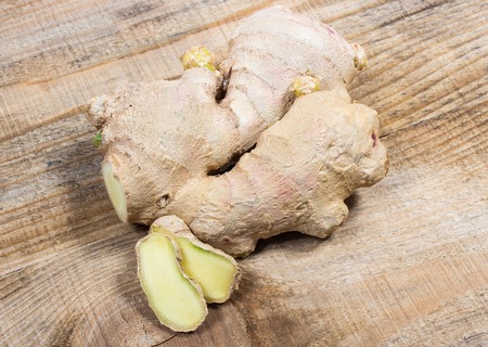 Closeup of fresh ginger on board. Natural medicine.