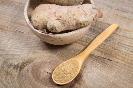 Closeup of fresh ginger on board. Natural medicine.の写真素材