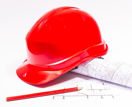 Closeup of red construction helmet. The concept of safe operation.の写真素材