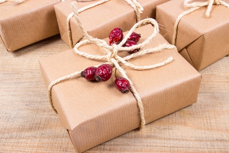 Rustic gifts for christmas with kraft paper.の写真素材