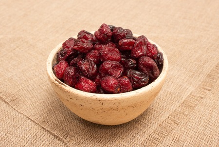 diet supplements dried cranberries on canvasの写真素材