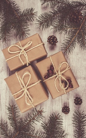 Rustic gifts for christmas with kraft paper.の写真素材