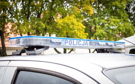 Poland, Poznan -October 1, 2016. Policja - view on the sign Polish police on the car.のeditorial素材