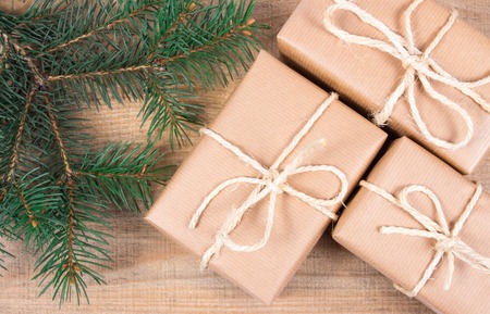 Rustic gifts for christmas with kraft paper.の写真素材