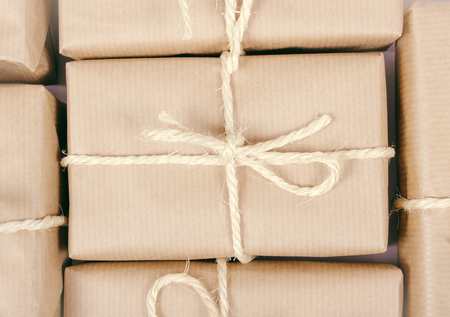 Close up of the rustic parcels gift box with kraft paper.の写真素材