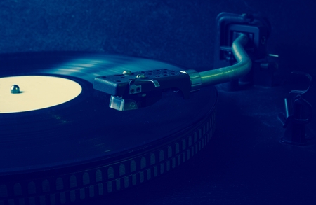 Black vinyl on the record player. CloseUpの写真素材