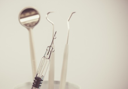 Disposable dental instruments. The concept of care for oral hygiene.の写真素材