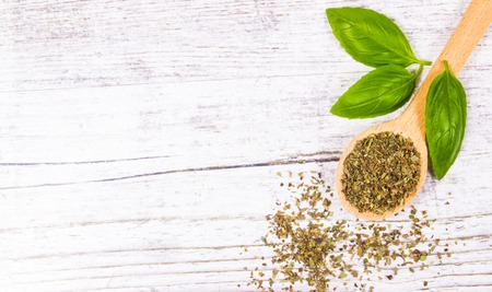 Fresh and dried basil, herbs and spices. Healthy eating concept.の写真素材