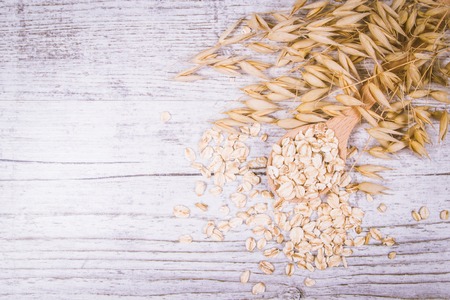 Raw oatmeal . Healthy eating concept .の写真素材