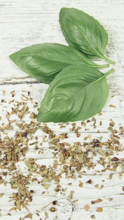 Fresh and dried basil, herbs and spices. Healthy eating concept.の写真素材