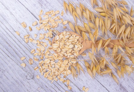 Raw oatmeal . Healthy eating concept .の写真素材