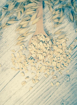 Raw oatmeal . Healthy eating concept .の写真素材