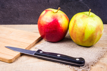 Fresh apple on a wooden background. Healthy eating concept.の写真素材
