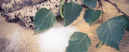 Xylitol - sugar substitute for diabetics. Birch sugar on wooden background.の写真素材