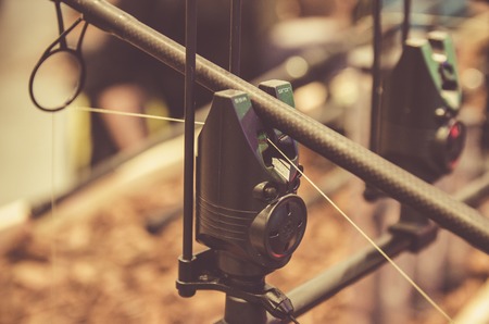 Poznan, Poland - February 10, 2018: Fishing fairs ,,Rybomania,, in Poland. Carp rod on the stand..の写真素材