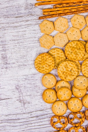 Mix of snacks : pretzels, crackers, cookies. Close Up.の写真素材