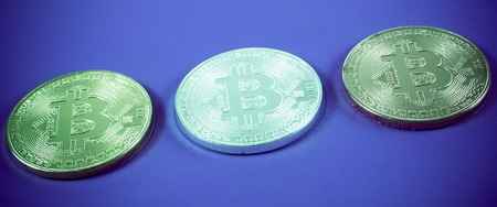 Bitcoin coin - symbol of crypto currency. Concept of electronic virtual money for web banking and international network payment.の写真素材