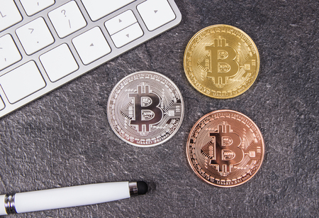 Bitcoin coin - symbol of crypto currency. Concept of electronic virtual money for web banking and international network payment.の写真素材