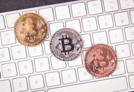 Bitcoin coin - symbol of crypto currency. Concept of electronic virtual money for web banking and international network payment.の写真素材