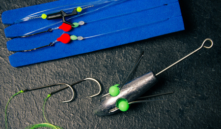 Surfcasting - a method of sea fishing. Fishing accessories used for sea fishing.の写真素材