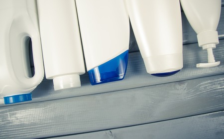 Plastic packaging for cosmetics and food. The concept of waste segregation. Recycling.