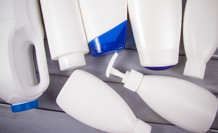 Plastic packaging for cosmetics and food. The concept of waste segregation. Recycling.
