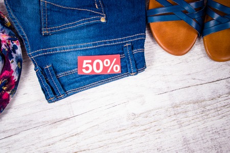 Female clothes on light background. Fashion women's accessories and wear. The concept of great...
