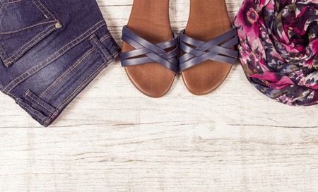 Female clothes on light background. Fashion women's accessories and wear. The concept of great shopping.の写真素材