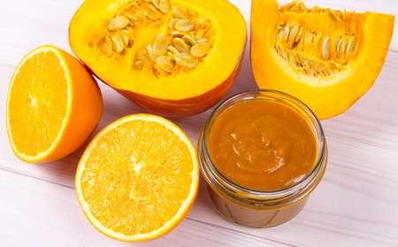 Pumpkin jam on a wooden background - homemade preserves.の写真素材