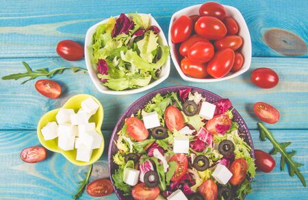 Conception of healthy eating. Fresh vegetable salad with feta cheese.
