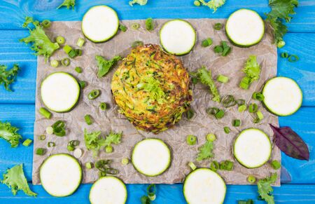 Vegetarian food - zucchini fritters on wooden background.の写真素材