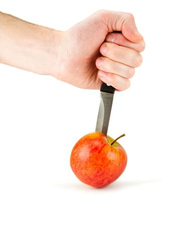 apple pierced by knifeの写真素材