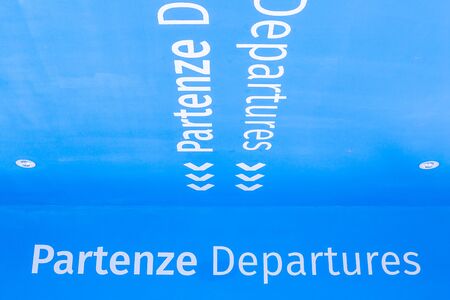 Departure sign of an airport. Entrance of the Trieste Airport with the departure gates, security control, shops and luggage claim.の写真素材