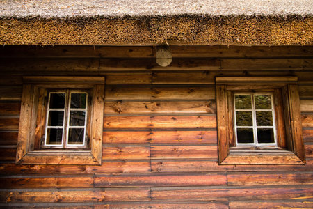 Traditional old wooden baltic house facade in detailの写真素材