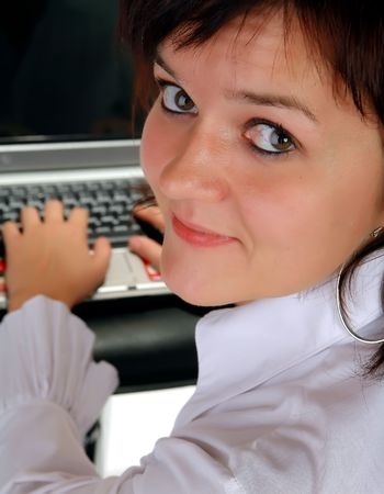 Girl working on the laptop computerの写真素材