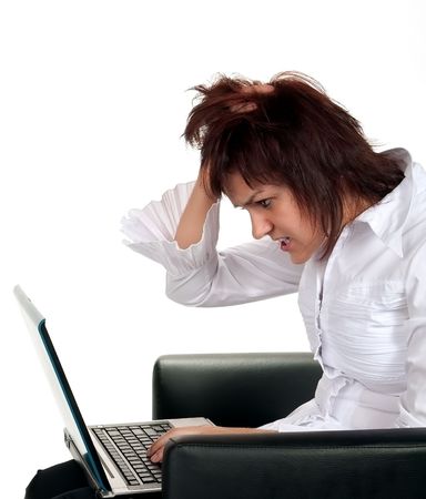 Frustraded girl with computer problemの写真素材