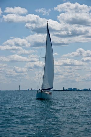 Sailing on sunny day on lake Michiganの写真素材