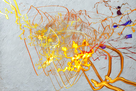 An abstract painting featuring vibrant, energetic swirls of yellow and orange, with hints of purple and blue, on a textured light gray background.の写真素材