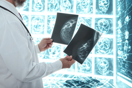 A medical professional in a white coat examines two X-ray images against a backdrop of illuminated...