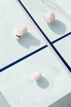 A close-up, overhead view of a game with pink pieces and dark blue lines on a textured light background.の写真素材