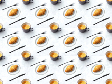 A repeating pattern of croissants coffee cups and cutlery arranged diagonally on a white background.の写真素材