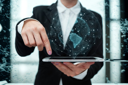 A server in a suit points to a tablet displaying a digital overlay of constellations and abstract shapes, suggesting advanced technology.の写真素材