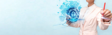 A person in a white lab coat touches a shimmering blue digital shield with a lock symbol, representing cybersecurity and data protection.の写真素材