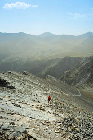 A hiker on a trail in the Carpathian mountains.の写真素材