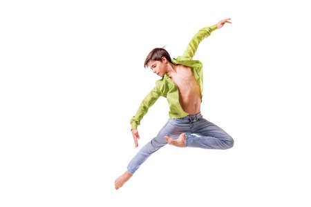 Ballet dancer teenage boy jumping barefoot, isolate on a white background.の写真素材