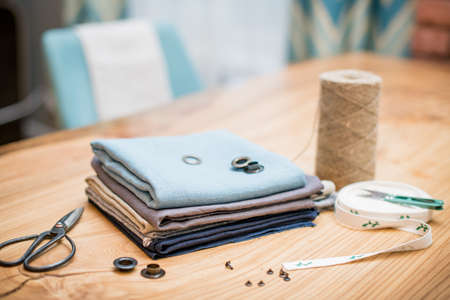 Linen scraps and sewing and handicraft tool kitの写真素材