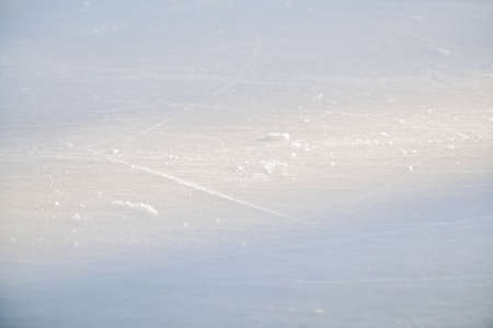 Ice rink floor, detail of a textured background ice, sportの写真素材
